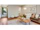 Comfortable living room featuring hardwood floors and neutral décor at 1622 Monroe St, Denver, CO 80206
