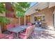 Enjoy outdoor gatherings on the patio, complete with a stone surface, covered area, and comfortable seating at 1622 Monroe St, Denver, CO 80206