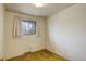Bedroom features carpeted floors, natural light and white walls at 1720 S Balsam St, Lakewood, CO 80232