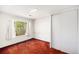 Functional bedroom with carpet floors, large window, closet, and white walls for a clean and inviting space at 3900 Garland St, Wheat Ridge, CO 80033