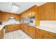 Traditional kitchen with wooden cabinets and stainless steel appliances at 3900 Garland St, Wheat Ridge, CO 80033