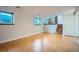 Spacious basement with wood floors and a staircase that goes to the main floor at 4664 S Zang St, Morrison, CO 80465