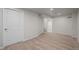 Finished basement with neutral carpeting and easy access to storage and other floors at 4499 E Colorado Ave, Denver, CO 80222