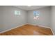 Charming bedroom boasting hardwood floors, natural light, and neutral walls at 4499 E Colorado Ave, Denver, CO 80222