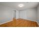 Comfortable bedroom with neutral walls and convenient access to a closet and ensuite at 4499 E Colorado Ave, Denver, CO 80222