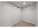 Walk-in closet with carpet and wire shelving for easy organization at 4499 E Colorado Ave, Denver, CO 80222