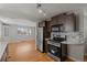 Charming kitchen boasts stainless steel appliances and a decorative tile backsplash at 4499 E Colorado Ave, Denver, CO 80222