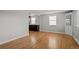 Bright living room featuring hardwood floors, neutral paint, and lots of natural light at 4499 E Colorado Ave, Denver, CO 80222