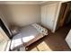 A bright bedroom is complete with a large window and a spacious closet at 9889 Aftonwood St, Highlands Ranch, CO 80126