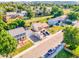 Aerial view of home highlighting lush greenery, landscaping, and ample parking at 12234 W Saratoga Ave, Morrison, CO 80465