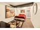 Basement bedroom offers neutral walls, plush carpet, and ample decorative lighting at 12234 W Saratoga Ave, Morrison, CO 80465