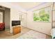 Bedroom boasts ample natural light with modern window, large closet, and neutral walls at 12234 W Saratoga Ave, Morrison, CO 80465