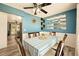Inviting dining room with a view to the kitchen and stylish decor at 12234 W Saratoga Ave, Morrison, CO 80465