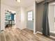 Light and airy entryway with views to the dining room at 12234 W Saratoga Ave, Morrison, CO 80465