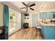 Kitchen-adjacent space boasting backyard access and updated appliances at 12234 W Saratoga Ave, Morrison, CO 80465