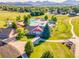 Aerial view of Weaver Hollow Park's pool and recreation area, with pool, greenery, and nearby walking path at 12234 W Saratoga Ave, Morrison, CO 80465