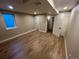 Large basement featuring vinyl floors, recessed lighting, and window at 2836 S Fenton St, Denver, CO 80227