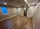 Spacious room with vinyl floors, neutral walls, and a window that provides natural light at 2836 S Fenton St, Denver, CO 80227