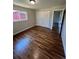 Bedroom with hardwood floors and double door closet perfect for storage at 2836 S Fenton St, Denver, CO 80227