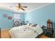 This bedroom features hardwood floors and neutral wall paint at 4931 S Danube St, Aurora, CO 80015