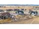 Aerial view of home and neighborhood with mountain views at 528 Nesting Eagles Way, Berthoud, CO 80513