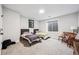 Basement bedroom with two twin beds and ample floor space at 528 Nesting Eagles Way, Berthoud, CO 80513