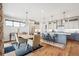 Bright dining area features hardwood floors and view to backyard at 528 Nesting Eagles Way, Berthoud, CO 80513