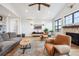 Living area featuring hardwood floors and a cozy seating arrangement at 528 Nesting Eagles Way, Berthoud, CO 80513