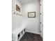 Functional mudroom with bench seating and storage at 528 Nesting Eagles Way, Berthoud, CO 80513