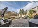 Backyard with patio and plenty of space for outdoor entertaining and relaxation at 5572 Fullerton Cir, Highlands Ranch, CO 80130
