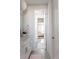 Clean bathroom with a view of a bedroom and updated finishes at 15601 W Eureka Ave, Morrison, CO 80465