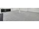 Spacious finished basement with neutral carpet and great natural light at 8357 Dudley Ct, Arvada, CO 80005