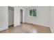 Clean bedroom with window and closet at 8357 Dudley Ct, Arvada, CO 80005
