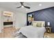 Bright bedroom showcasing an ensuite bathroom with double vanity sinks at 8357 Dudley Ct, Arvada, CO 80005