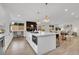 Gourmet eat-in kitchen boasts stainless steel appliances and modern finishes at 8357 Dudley Ct, Arvada, CO 80005