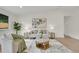 Bright and inviting living room featuring neutral colors, hardwood floors, and stylish decor at 8357 Dudley Ct, Arvada, CO 80005