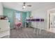 Stylish bedroom with a loft bed, desk, and window at 8677 S Buchanan Way, Aurora, CO 80016