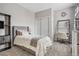 Cozy bedroom features carpet and ample closet space at 8677 S Buchanan Way, Aurora, CO 80016