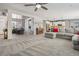 Bright and airy living spaces flow seamlessly, showcasing an open floor plan for easy entertaining at 8677 S Buchanan Way, Aurora, CO 80016