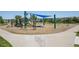 Community playground featuring multiple play structures, swings, and a covered shade area at 8677 S Buchanan Way, Aurora, CO 80016