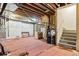 Unfinished basement providing ample space for storage and customization at 6765 S Old Hammer Ct, Aurora, CO 80016