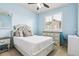 Comfortable bedroom featuring a window with blinds, carpet and ample light at 6765 S Old Hammer Ct, Aurora, CO 80016