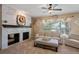 Living room with whitewashed brick fireplace and comfortable seating area at 1194 W 125Th Dr, Denver, CO 80234