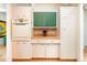 Vintage kitchen features charming cabinets and countertops, and built-in oven at 1831 S Ivanhoe St, Denver, CO 80224