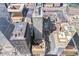 Aerial view of city with a brick building with many windows surrounded by other buildings in an urban landscape at 444 17Th St # 1003, Denver, CO 80202