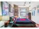 Bright bedroom with large window and decorative accents at 444 17Th St # 1003, Denver, CO 80202