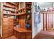 Entryway with wooden bench seating, built-in shelves, and storage at 444 17Th St # 1003, Denver, CO 80202