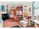 Living area featuring eclectic artwork, a piano, comfortable seating, and a large cabinet at 444 17Th St # 1003, Denver, CO 80202