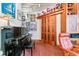 Inviting living room with a piano, a leather chair, and creative decorations at 444 17Th St # 1003, Denver, CO 80202