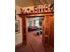 A view from the living room through a unique set of wooden doors with an artsy interior at 444 17Th St # 1003, Denver, CO 80202